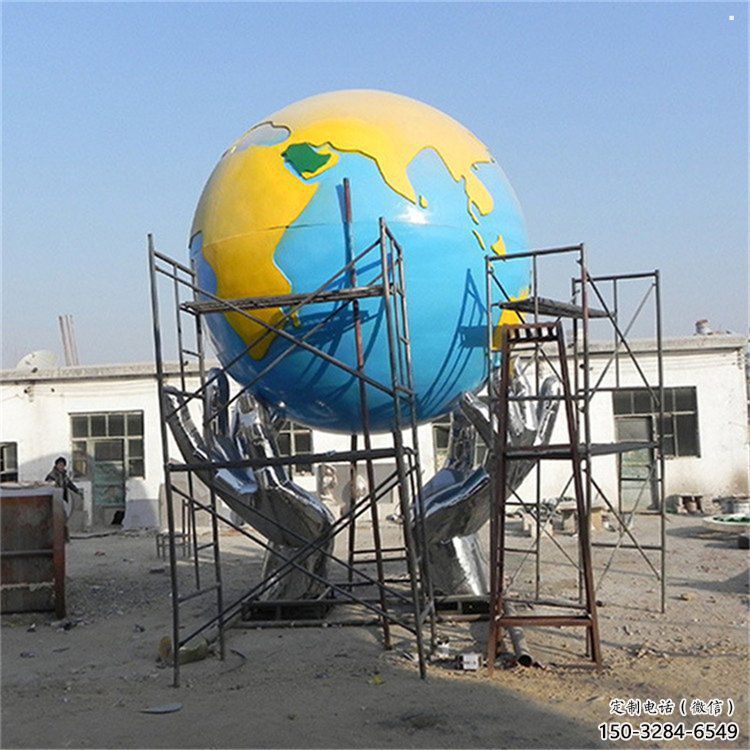 地球仪雕塑制作,村标概念,锻钢手托地球仪雕塑厂家 地球仪雕塑制作,村标概念,锻钢手托地球仪雕塑厂家